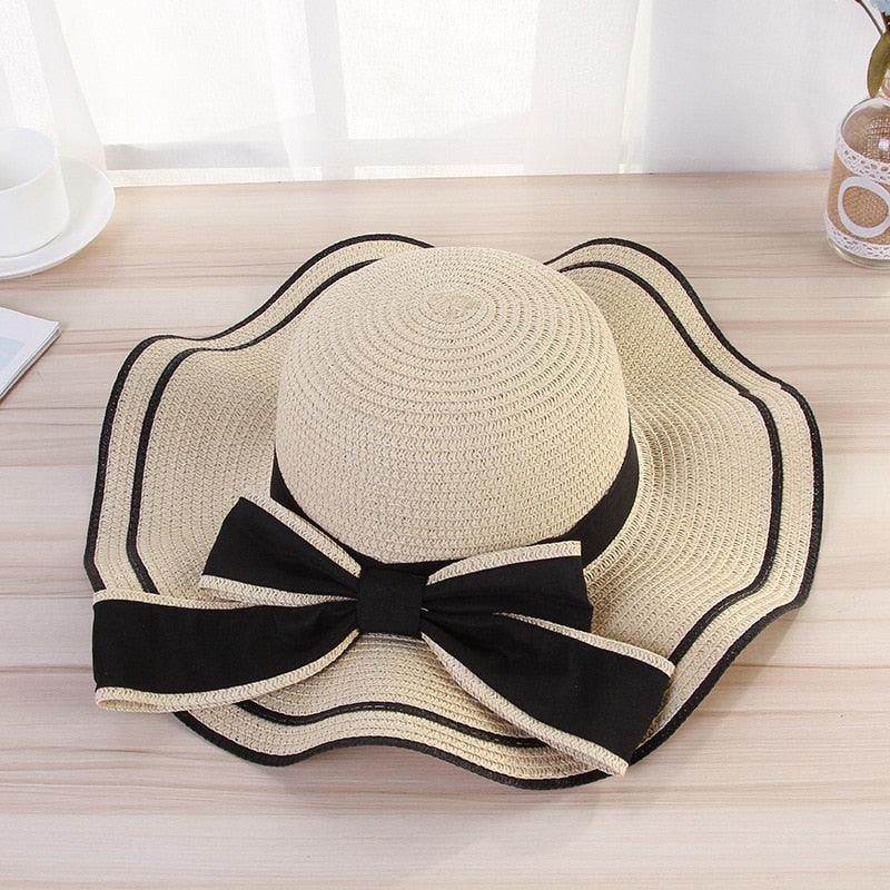 Women's Wide Brim Straw Beach Hat with Luxury Bowknot Detail