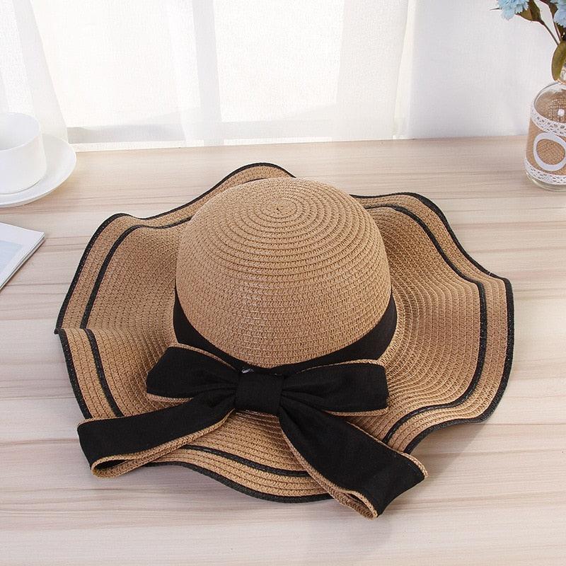 Women's Wide Brim Straw Beach Hat with Luxury Bowknot Detail