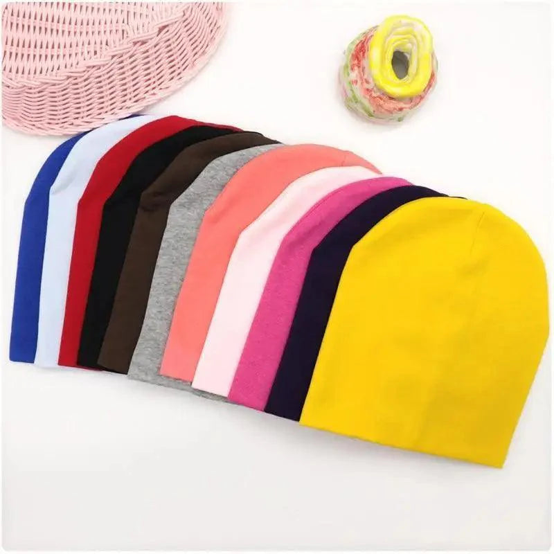 A trendy, solid-colored knitted beanie with a two-tier design suitable for boys and girls.