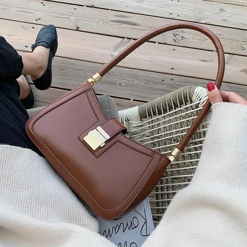Minimalist solid color PU leather crossbody shoulder bag in black, brown, and maroon