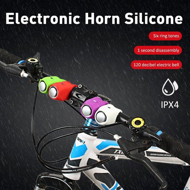 Portable USB rechargeable electric bicycle horn made of durable silicone.