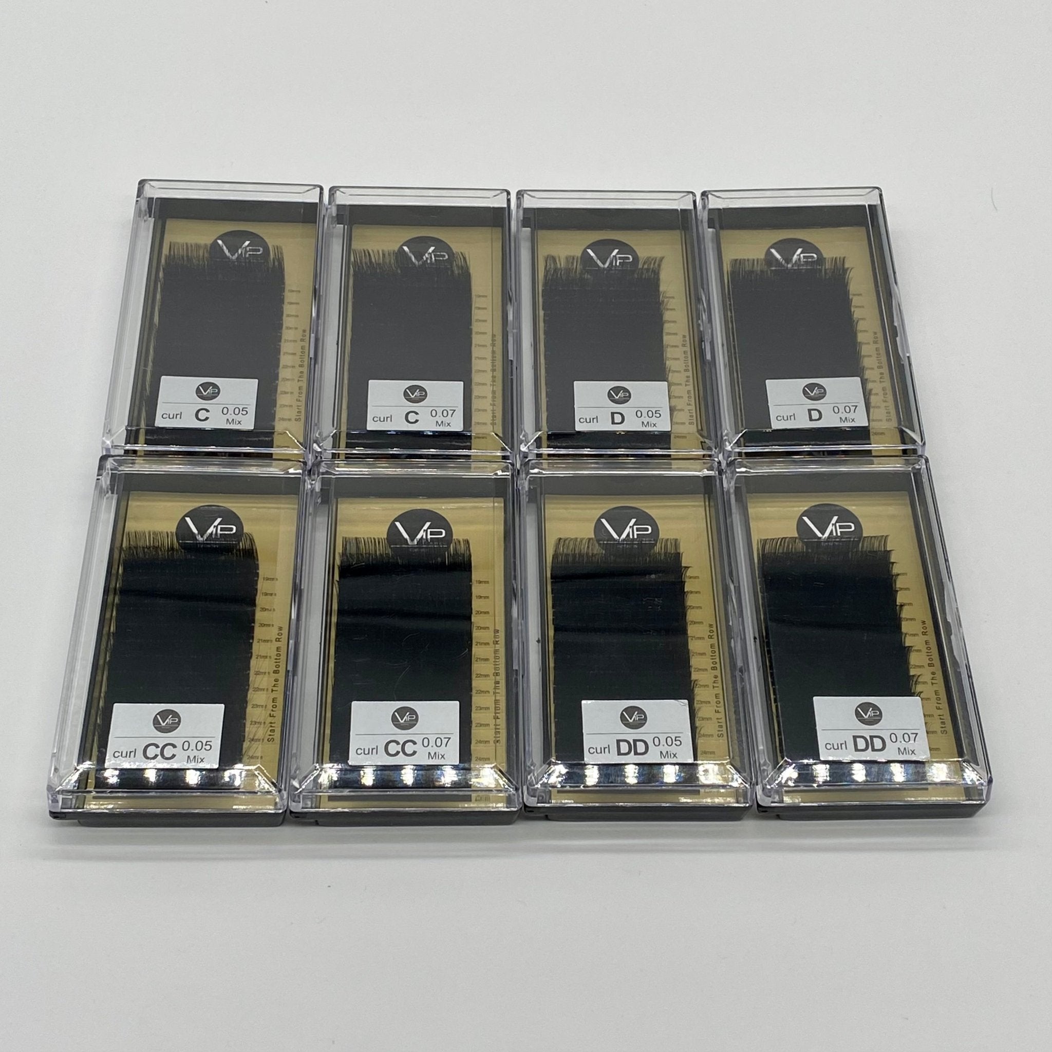 VIP Faux Mink XL lash extension palette featuring black lashes on a gold backing card.