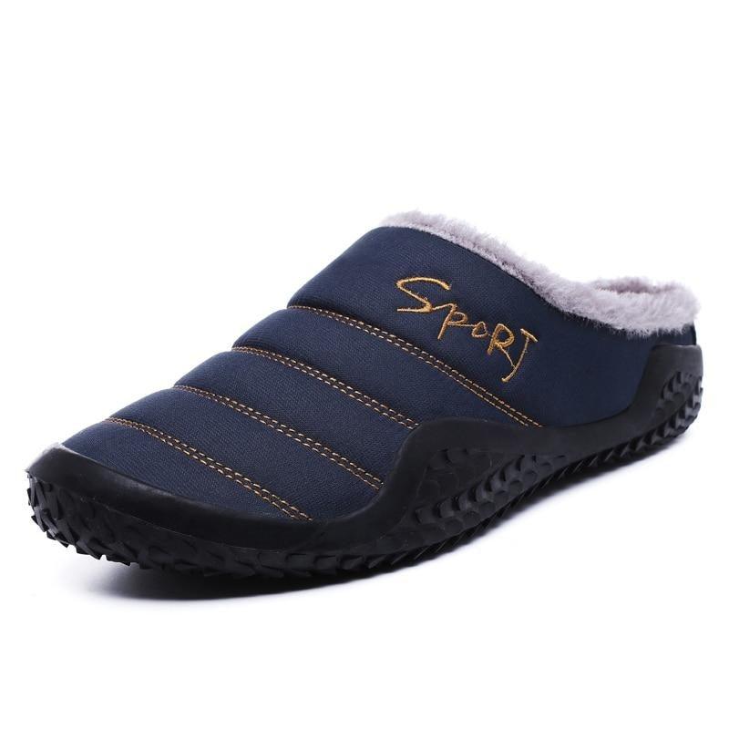 Men's navy and black sporty indoor slippers with faux fur lining and rubber soles