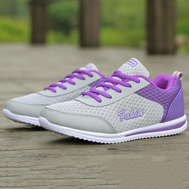 Purple chunky sneakers featuring breathable mesh fabric and a durable non-slip sole.