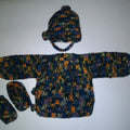 Vintage-style crochet newborn duster cardigan in a multicolor variegated yarn