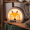 Cute wooden deer-shaped LED night light for a nursery