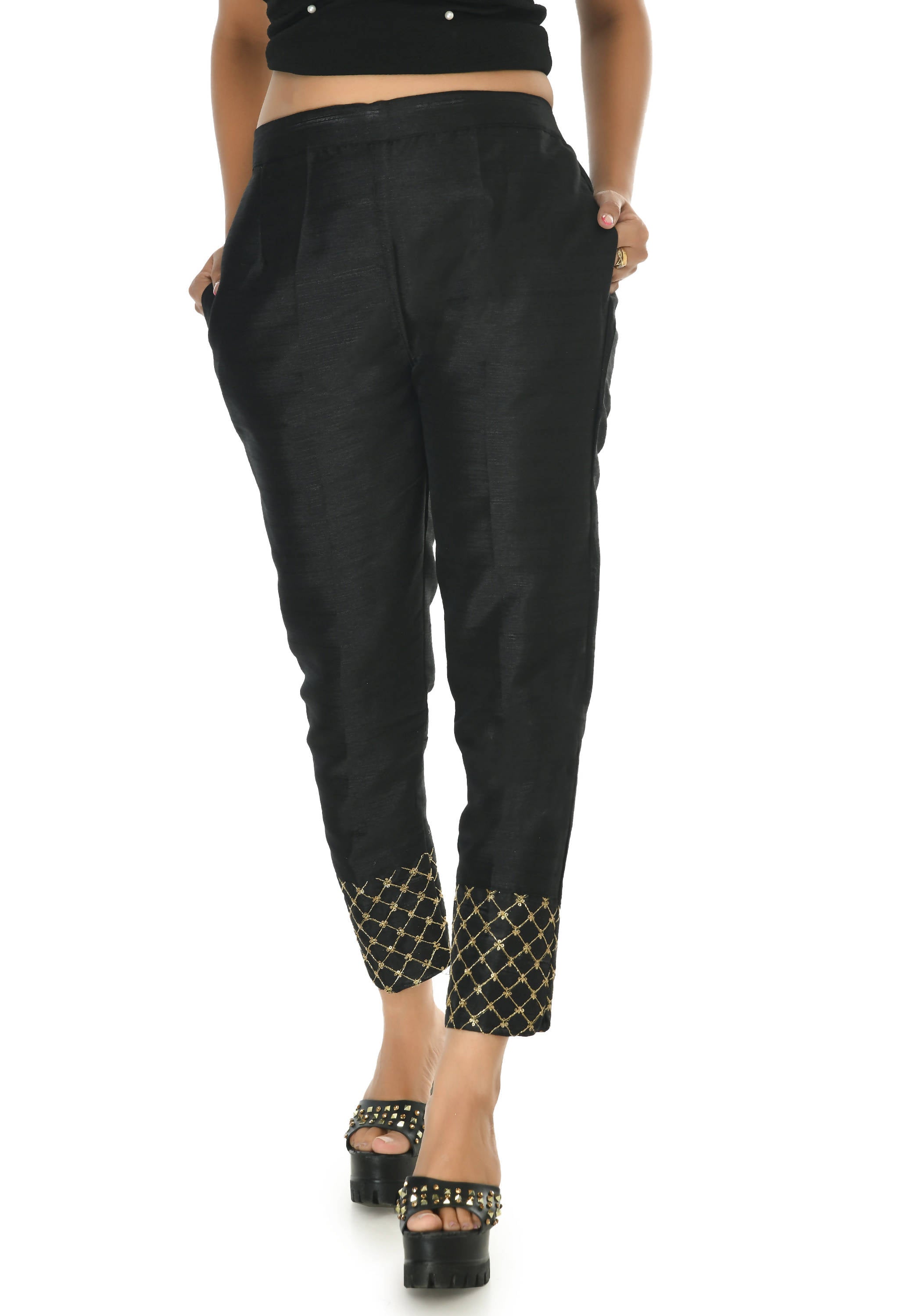 A pair of sleek black ankle-length silk pants with a slip-on design.