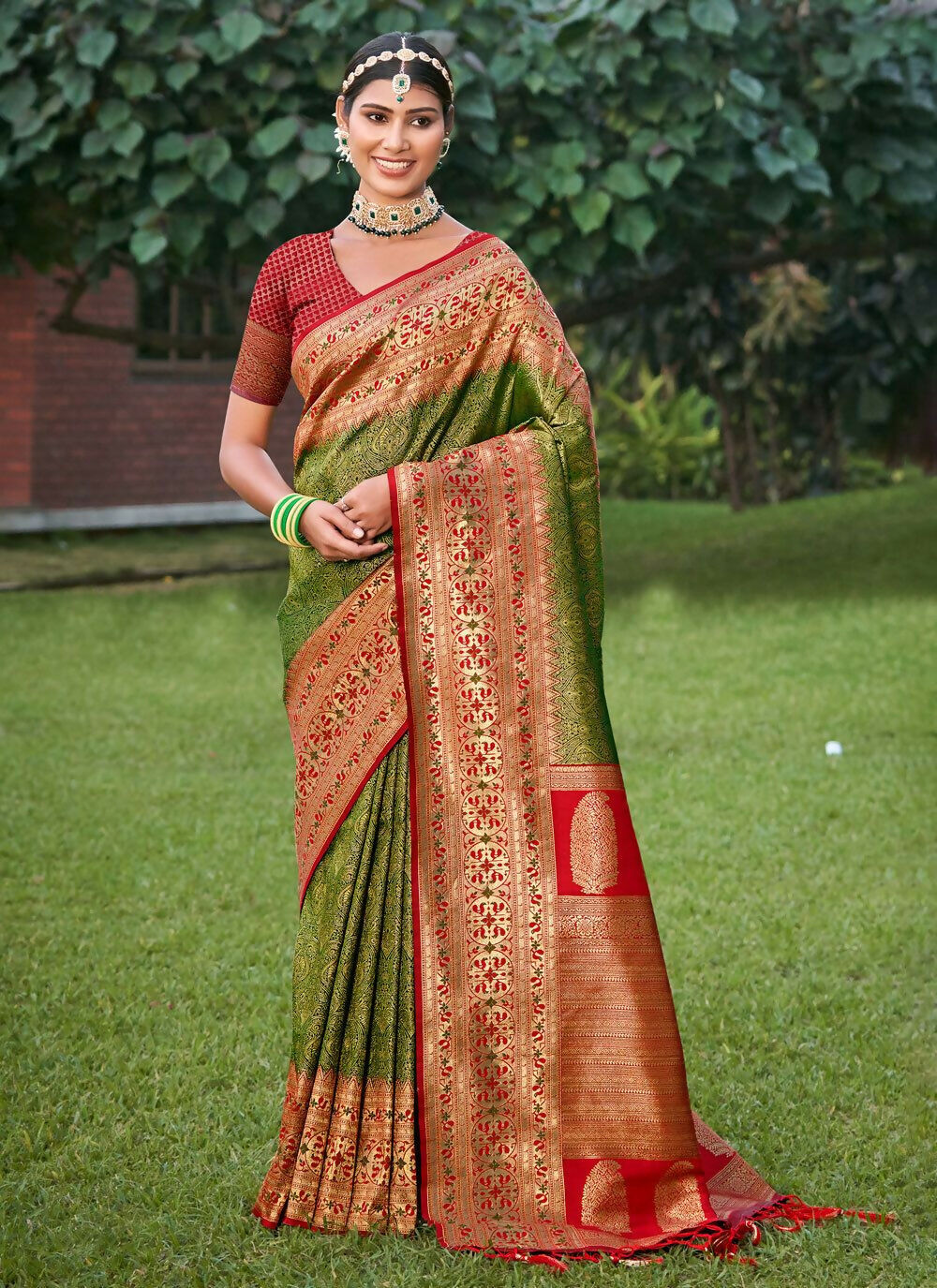 Mehandi golden Banarasi silk saree with matching blouse piece draped elegantly