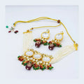 Traditional Kundan work necklace in gold, white, maroon, and green with adjustable cord