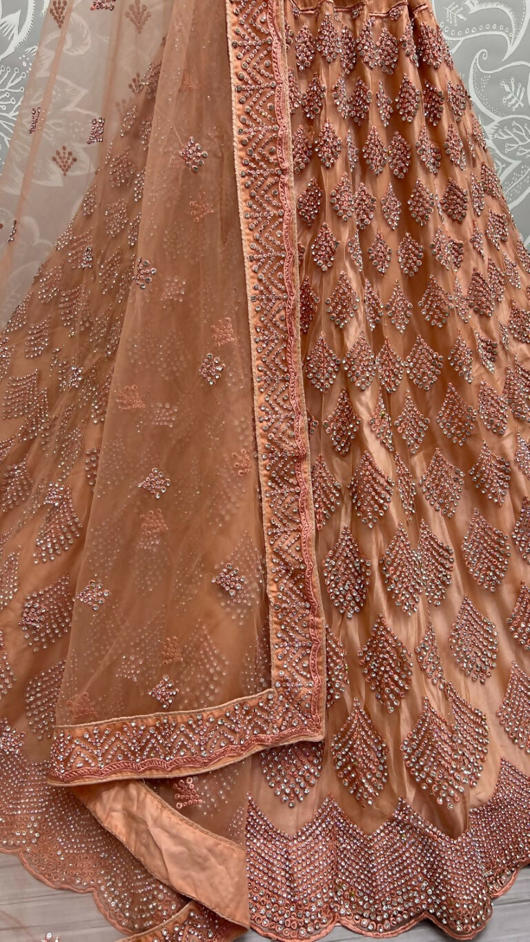 Peach Bridal Net Lehenga Choli with Zircon and Dori Work