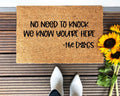 A casual brown coir doormat with black text reading No Need To Knock.