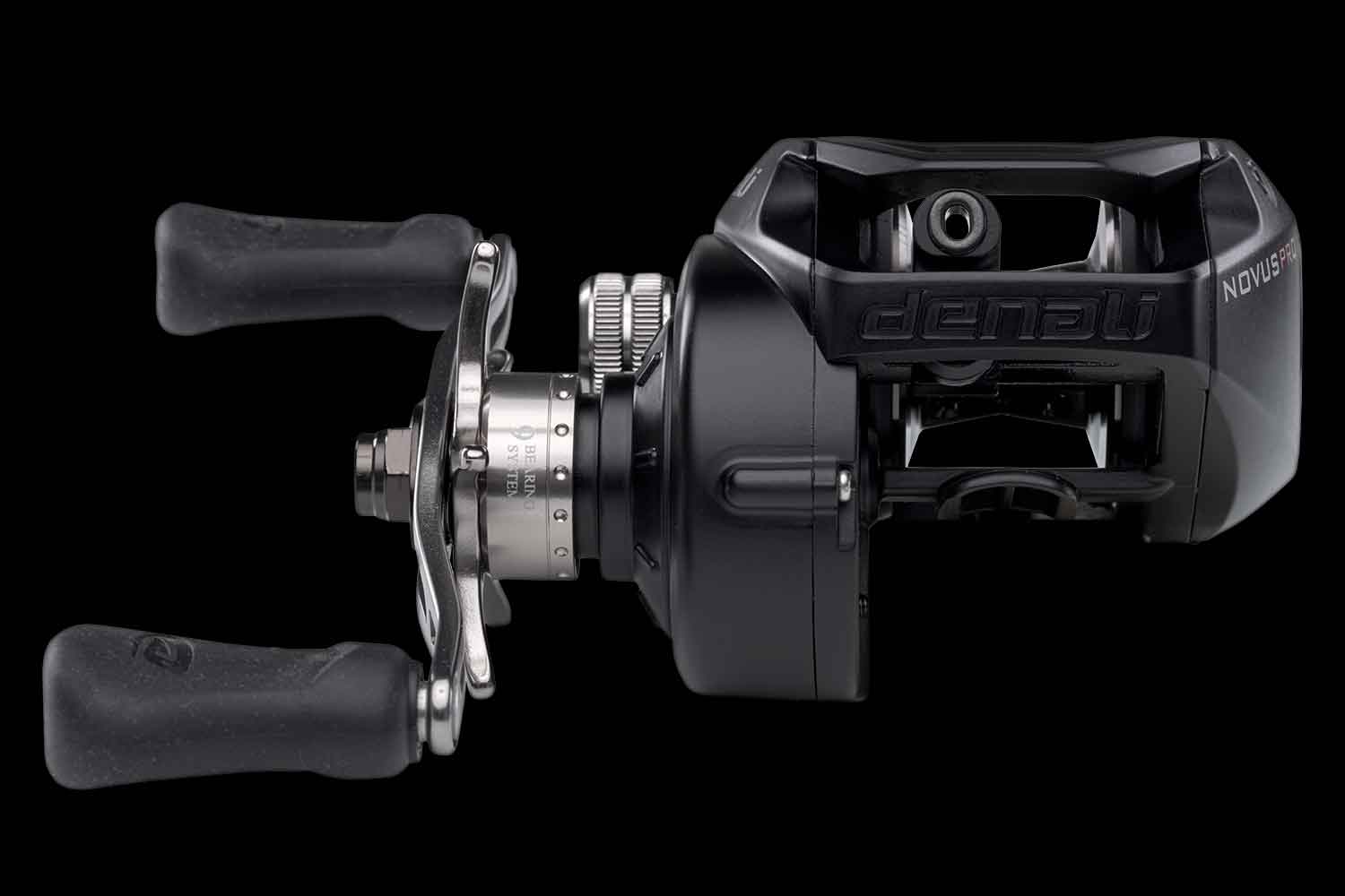Novus Pro black low-profile casting reel showing side adjustment dial and handle