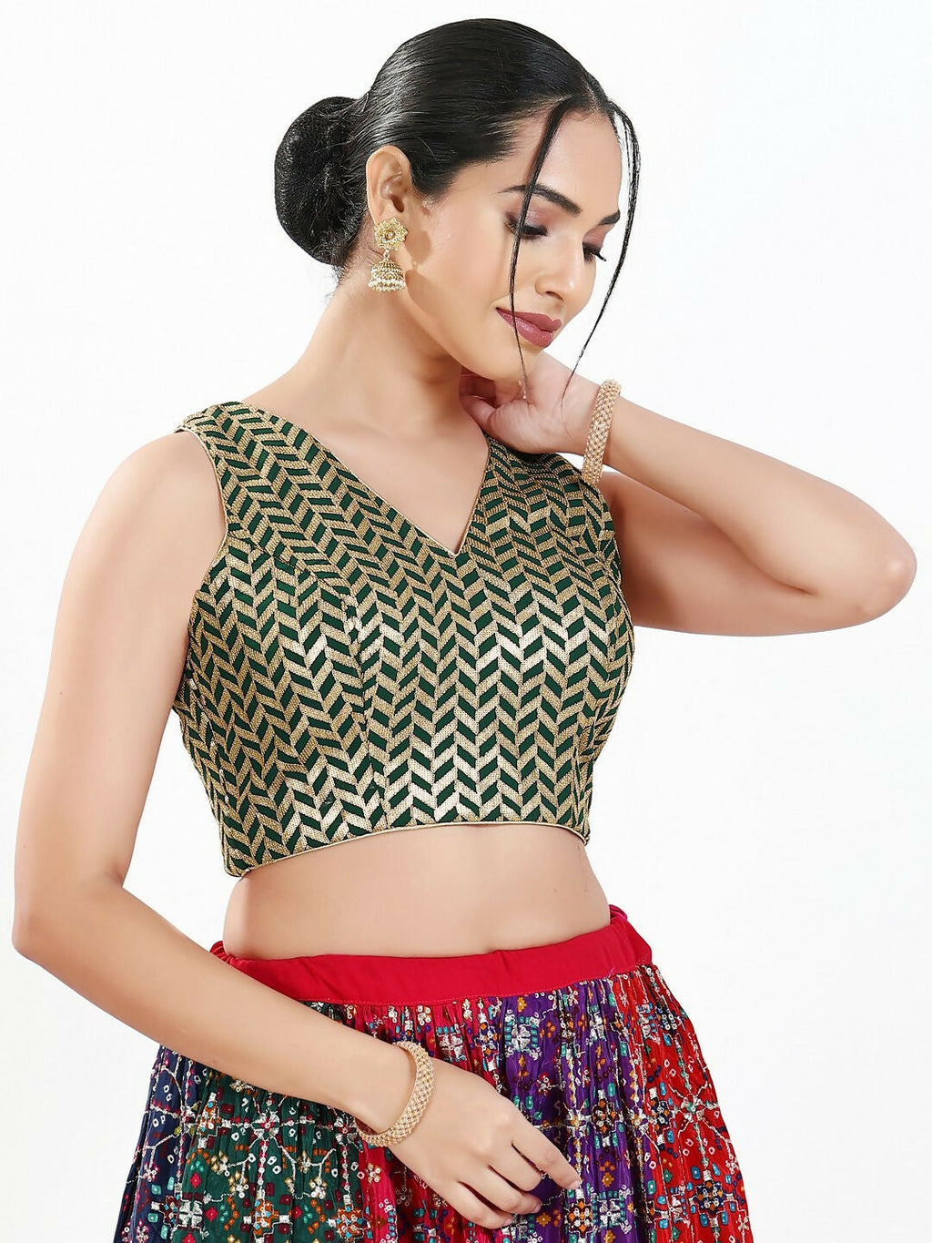 Bottle green silk sleeveless blouse with a sweetheart neckline