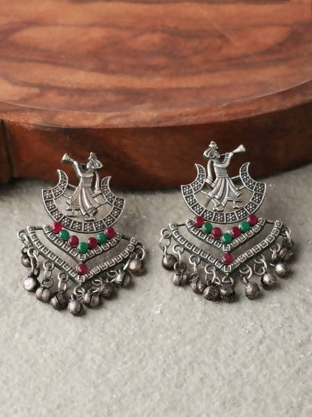 Close-up of Mominos Fashion Johar Kamal silver-plated oxidised brass ghungroo earrings with multi-stone detail