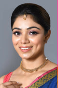 Elegant golden and white Polki necklace set with matching earrings for women