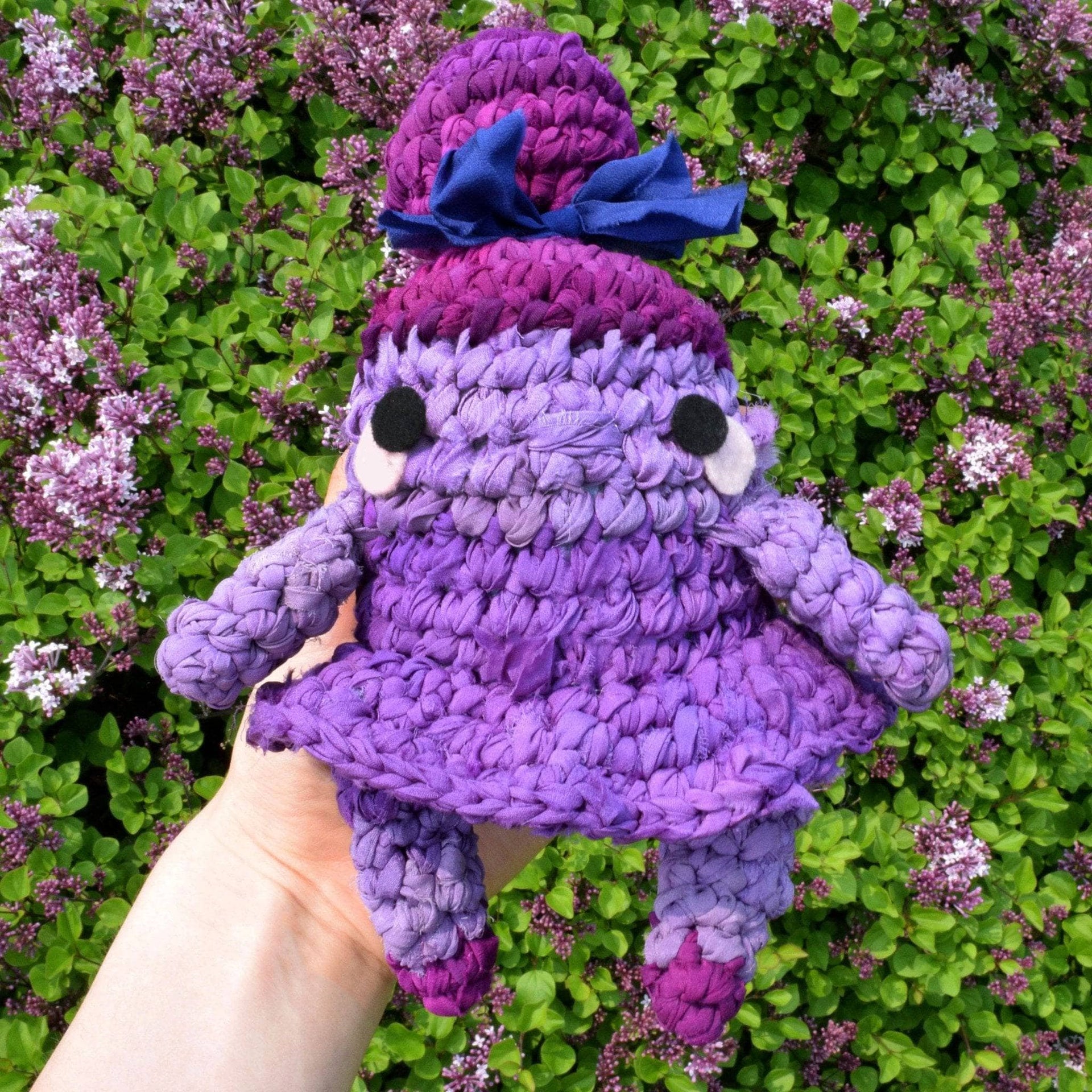 Finished Nutcracker and Sugar Plum Fairy amigurumi dolls displayed as part of a festive holiday craft set.
