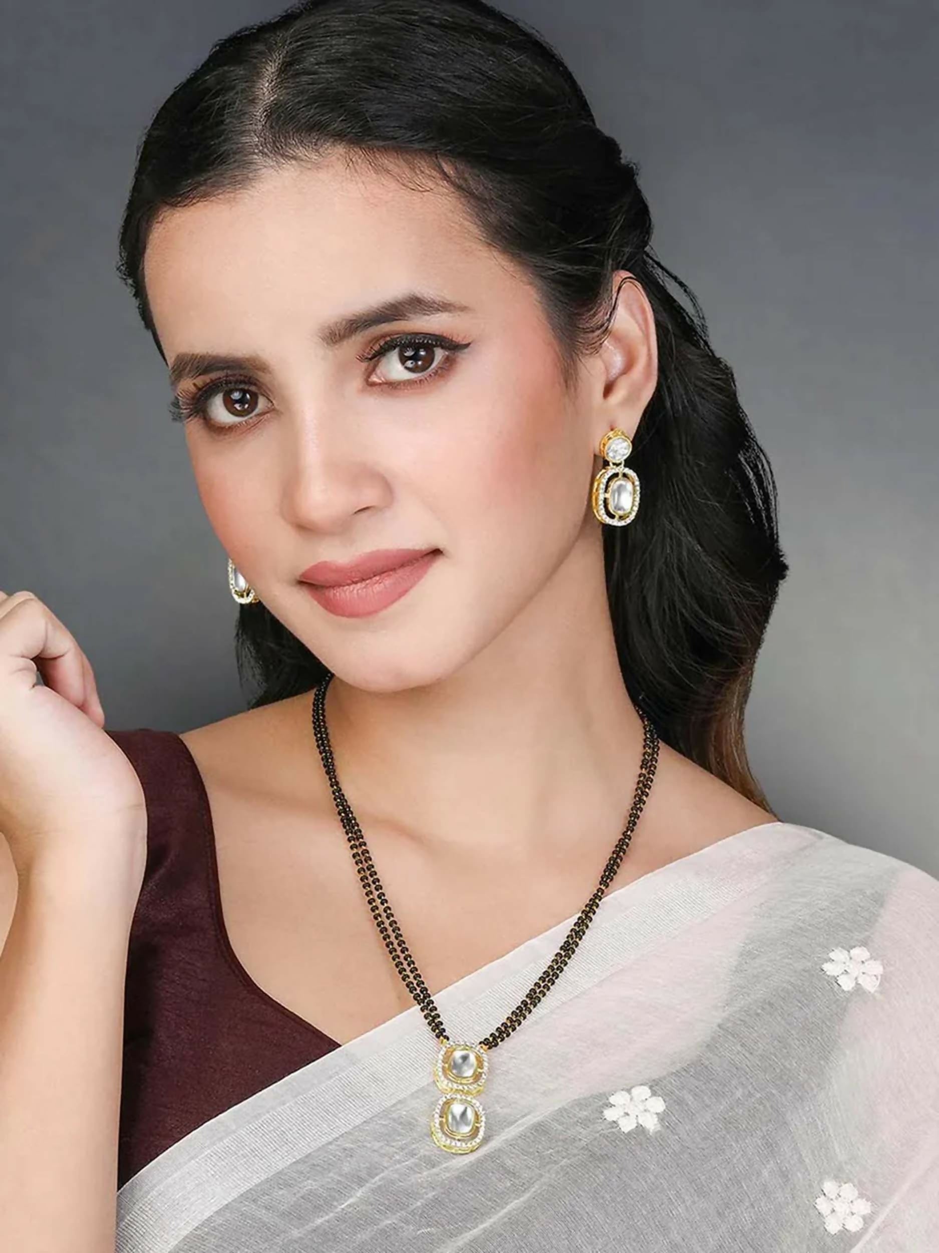 Gold-plated Mangalsutra set with matching earrings for traditional wear