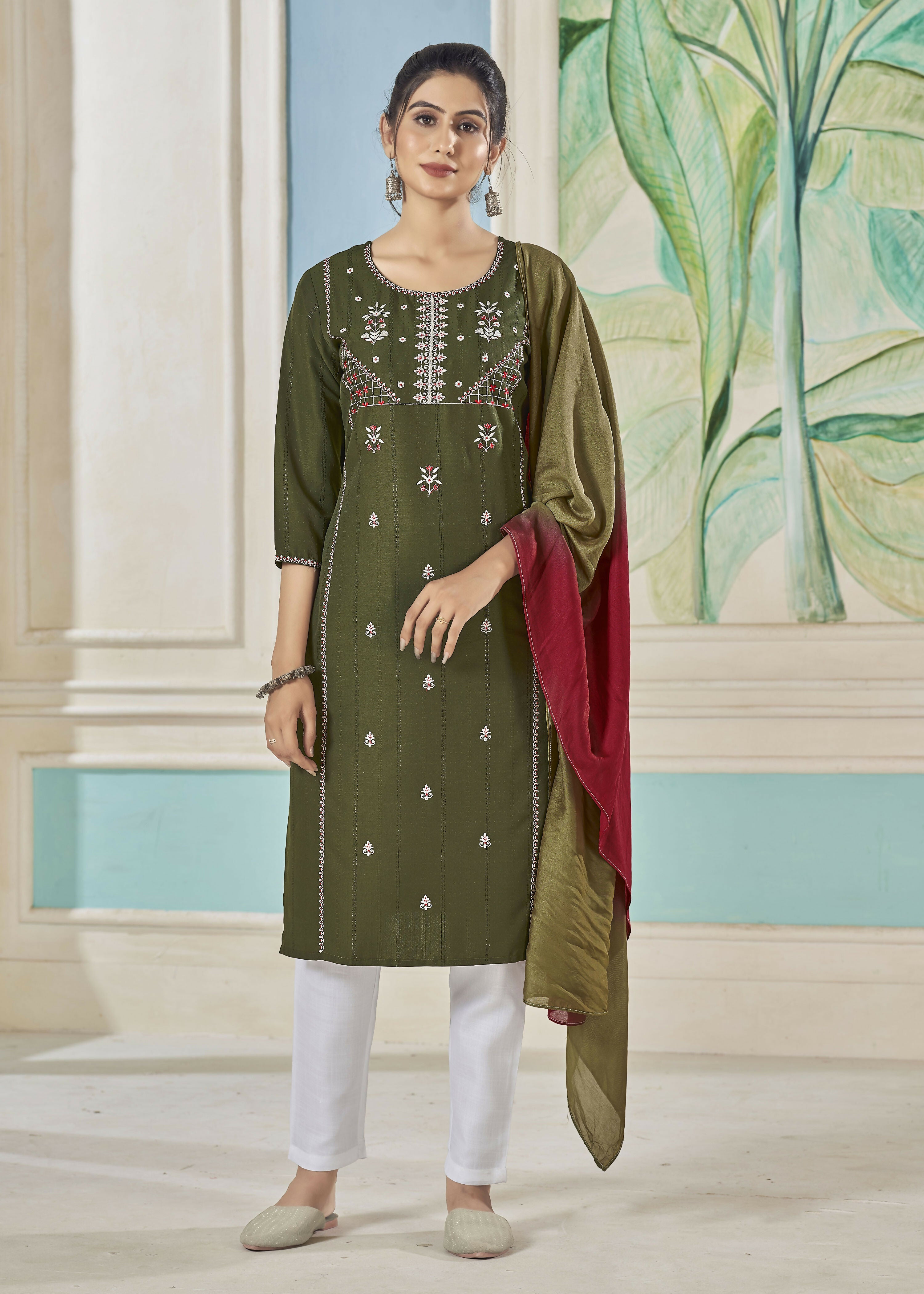 Woman wearing a Mehendi green pure viscose striped kurta set with white embroidery and contrasting dupatta