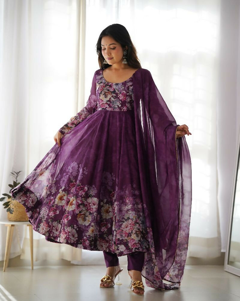 A 3-piece wine-colored organza kurta set featuring intricate sequin embroidery.