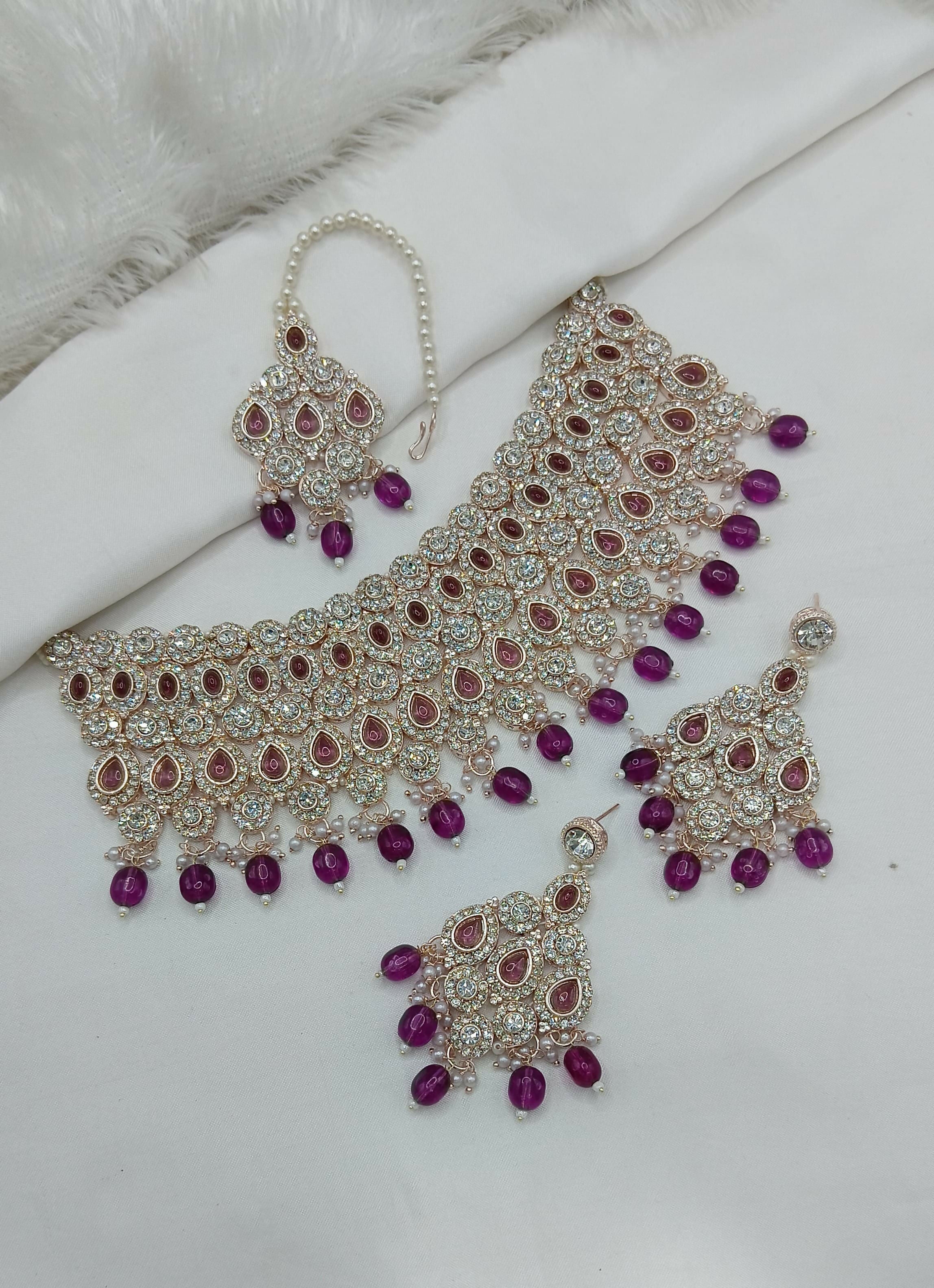 Ruby stone necklace set with earrings and maang tikka for bridal wear