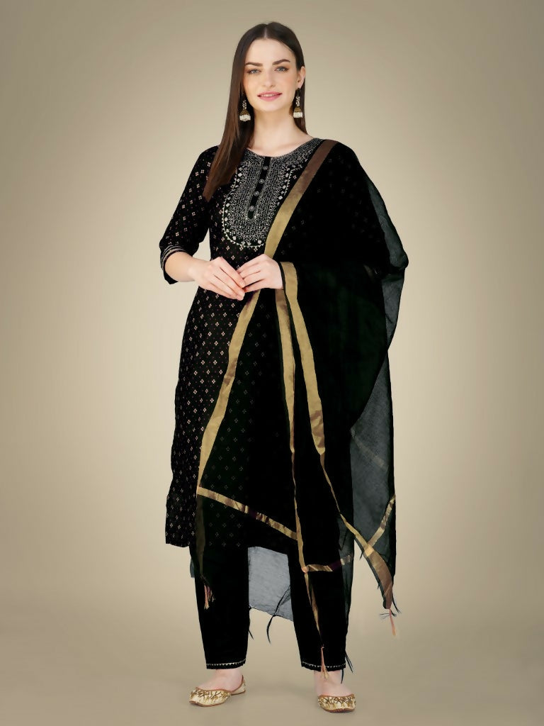Woman wearing a black Cotton Magic Slub straight kurta with embroidery and sequence work, paired with trousers and dupatta.