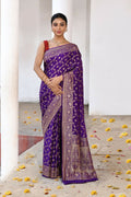 Purple crepe chiffon handloom Banarasi silk saree featuring delicate texture.