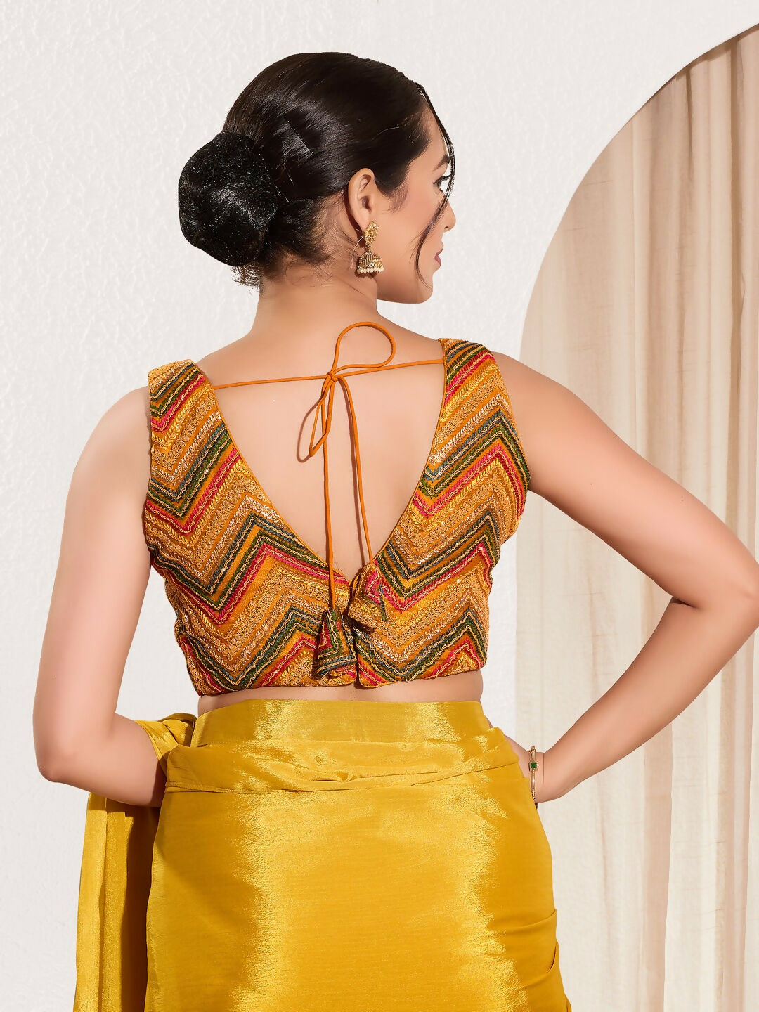 Mustard Net V-Neck Sleeveless Padded Blouse
