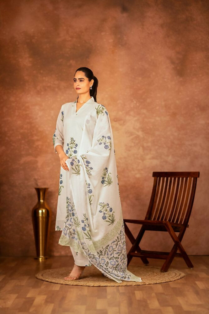 Off white and blue hand block printed cotton suit set on a display mannequin