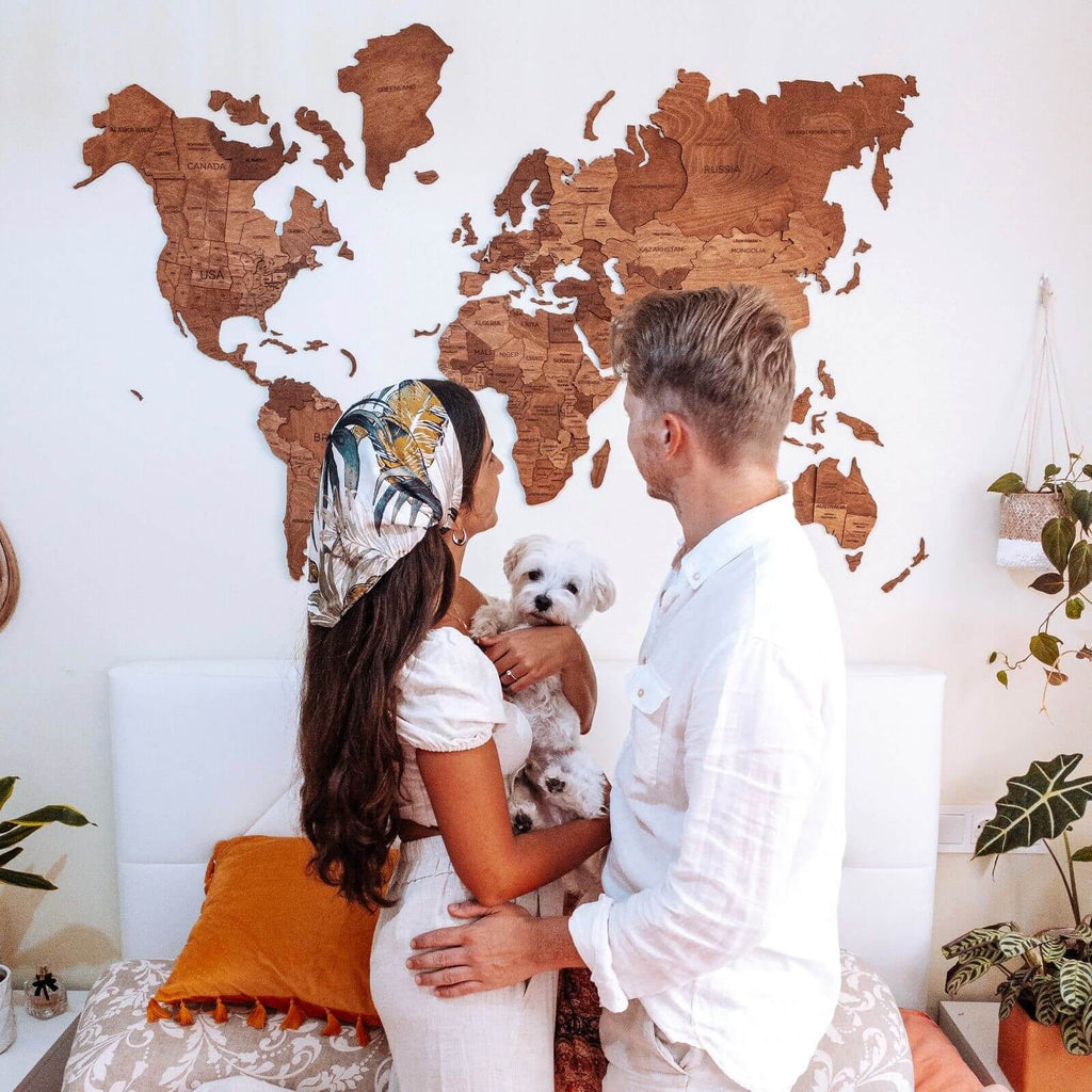 3D Wooden World Map in natural Oak finish mounted on a neutral wall