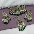Exquisite green alloy choker necklace set featuring intricate detailing for traditional festive wear.