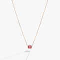 October birthstone pendant necklace with blush baguette crystals in a barrel design