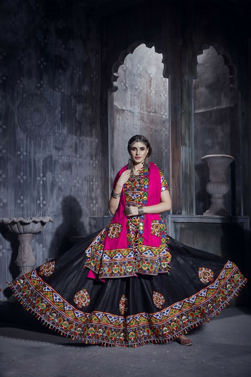 Black art silk Navratri lehenga choli set with a vibrant pink dupatta