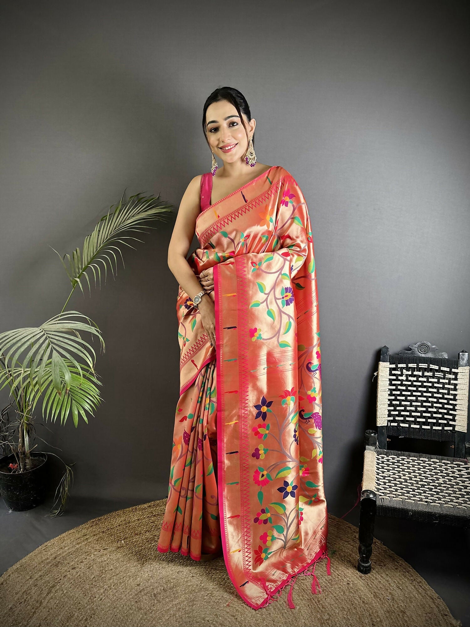 Reddish Pink Soft Silk Paithani saree with classic peacock and floral designs
