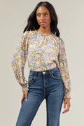 Liane Floral Long Sleeve Blouse featuring poet sleeves, ruffle neck detail, and smocked cuffs in a relaxed fit.