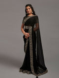 Chic black Zometo saree with intricate embroidery and lace border
