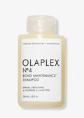 Olaplex No. 4 Bond Maintenance Shampoo in white and clear bottle