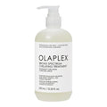 Olaplex Broad Spectrum Chelating Treatment bottle in white, 370 mL professional hair detox solution.