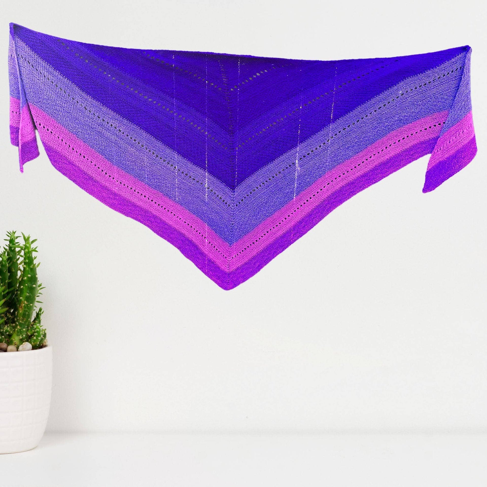 Luxurious ombre sport-weight silk shawl featuring intricate stitch sampler patterns.