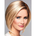 Rooted blonde synthetic lace front wig with a shattered, tousled cut and mono part.