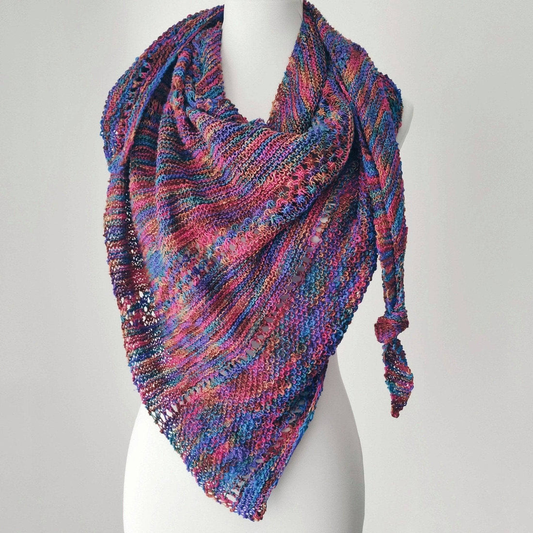Openwork Lattice lace weight shawl in a variety of colors displayed beautifully