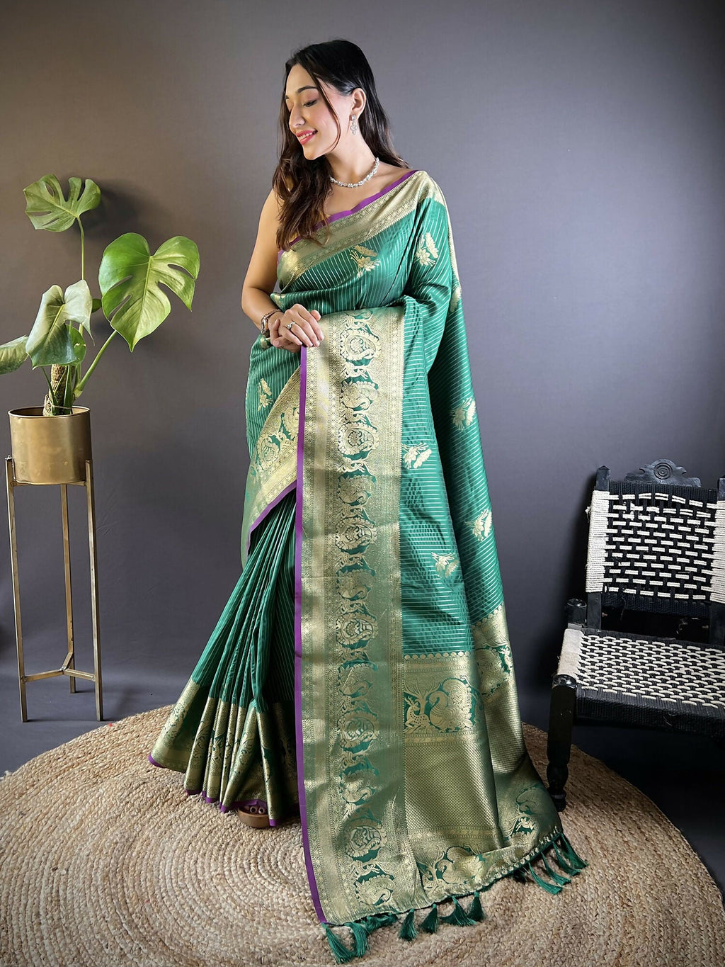 Green soft silk Leheriya saree featuring striped floral motifs and matching blouse fabric