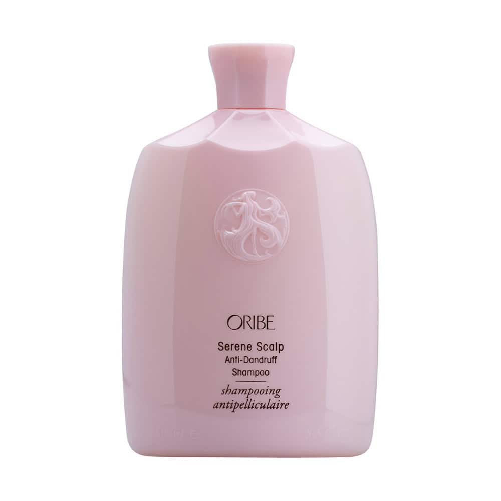 Pink bottle of Oribe Serene Scalp Anti-Dandruff Shampoo 33.8 fl. oz.