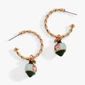 Polished gold twisted hoop earrings with crystal bow charms and pastel accents