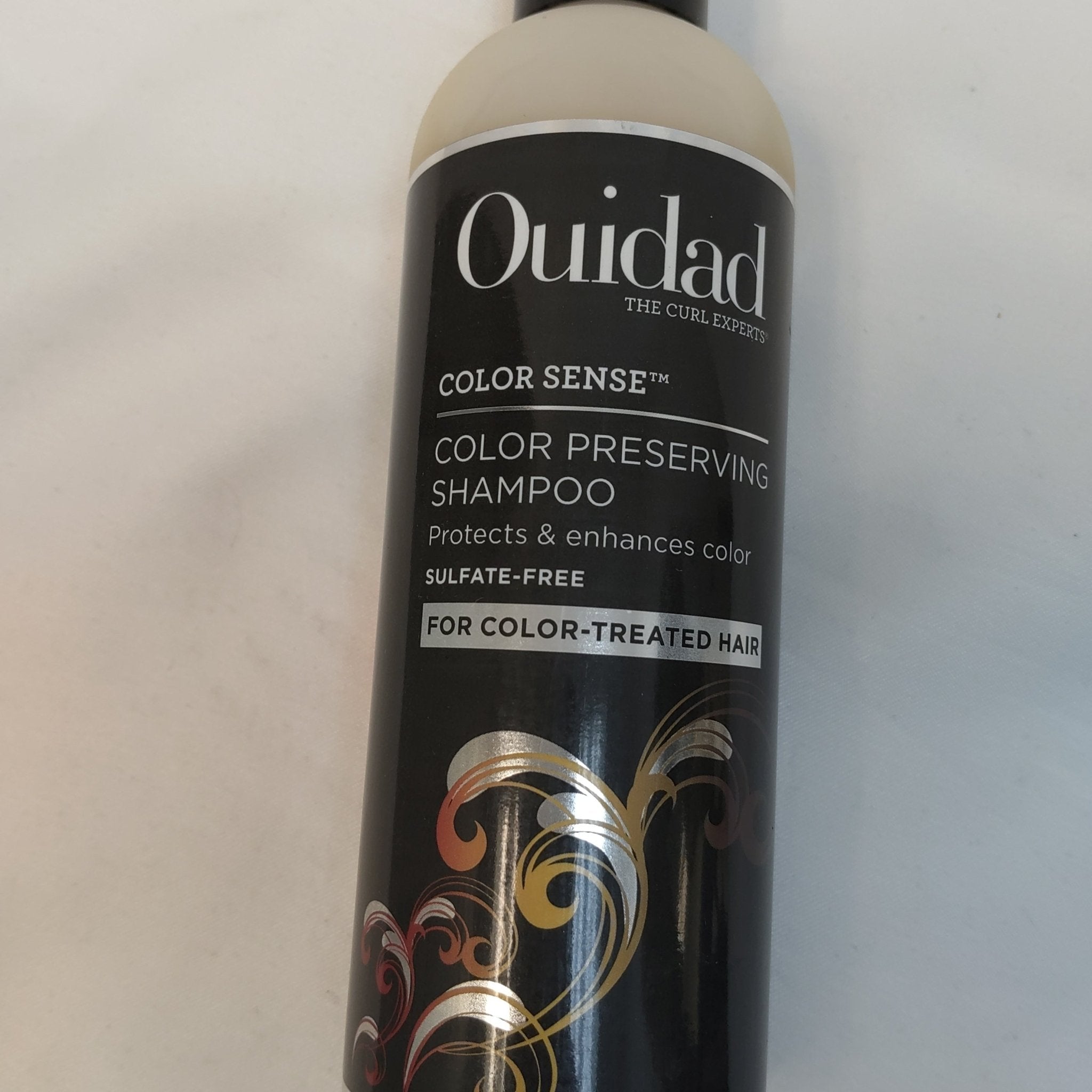 Bottle of Ouidad Color Sense Color Preserving Shampoo 8.5 oz for color-treated hair