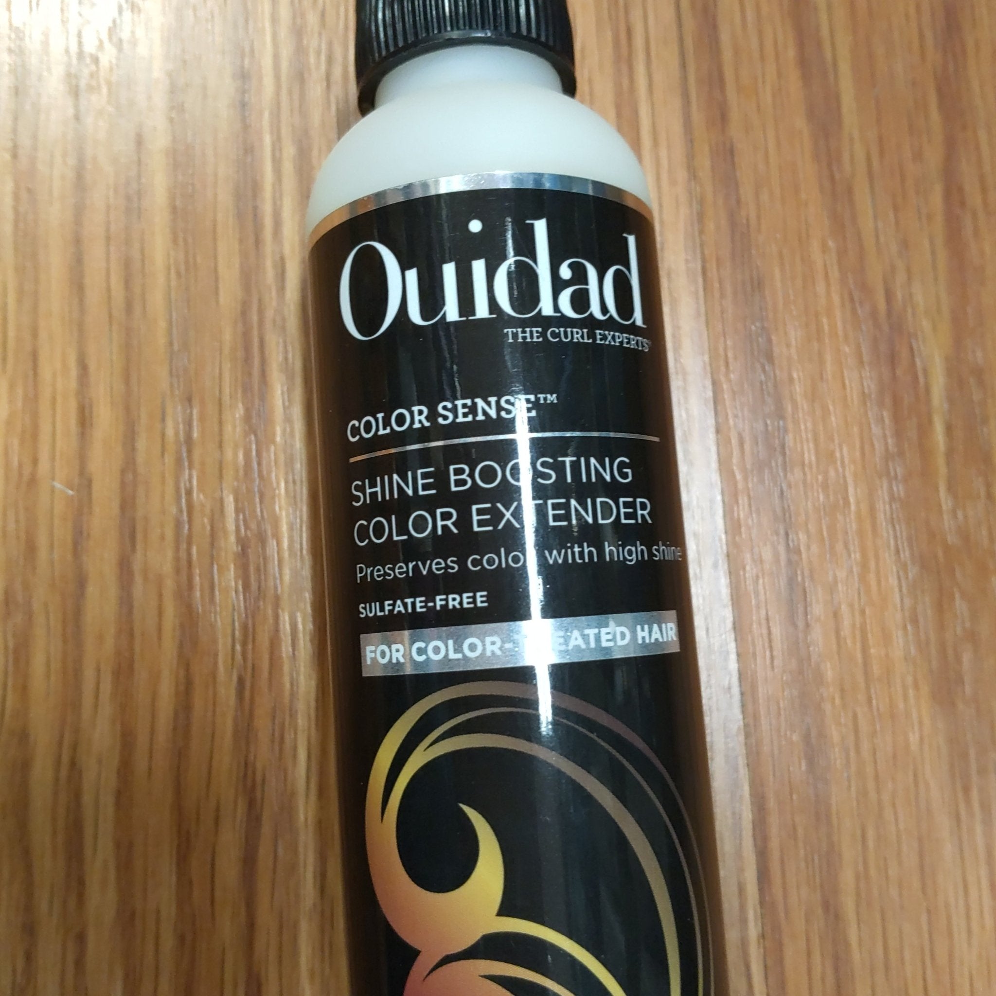 Ouidad Color Sense Shine Boosting Color Extender bottle for color-treated hair