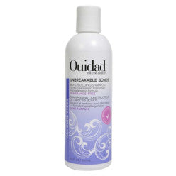White bottle of Unbreakable Bonds shampoo with purple gradient accent.