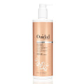 Ouidad Curl Shaper Double Duty Weightless Cleansing Conditioner 33.8 oz bottle in white and copper