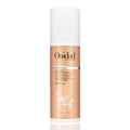 Ouidad Curl Shaper Memory Maker 3-in-1 Revitalizing Milk in a white and copper pump bottle.