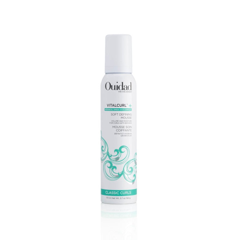 Ouidad VitalCurl Plus Soft Defining Mousse in a clean white bottle with teal branding.