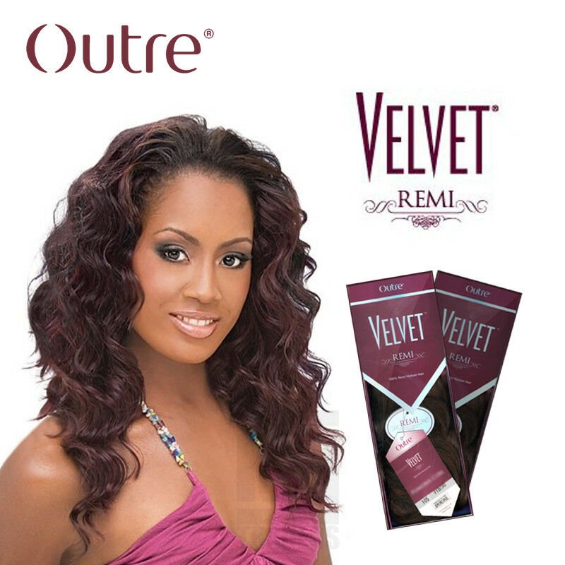 Model showcasing luxurious Outre Velvet Remi Euro Deep Wave human hair extensions in natural dark brown